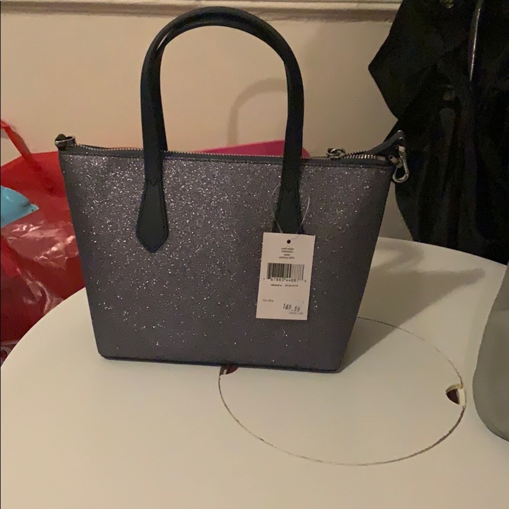 Sparkly Kate Spade Small messenger bag.